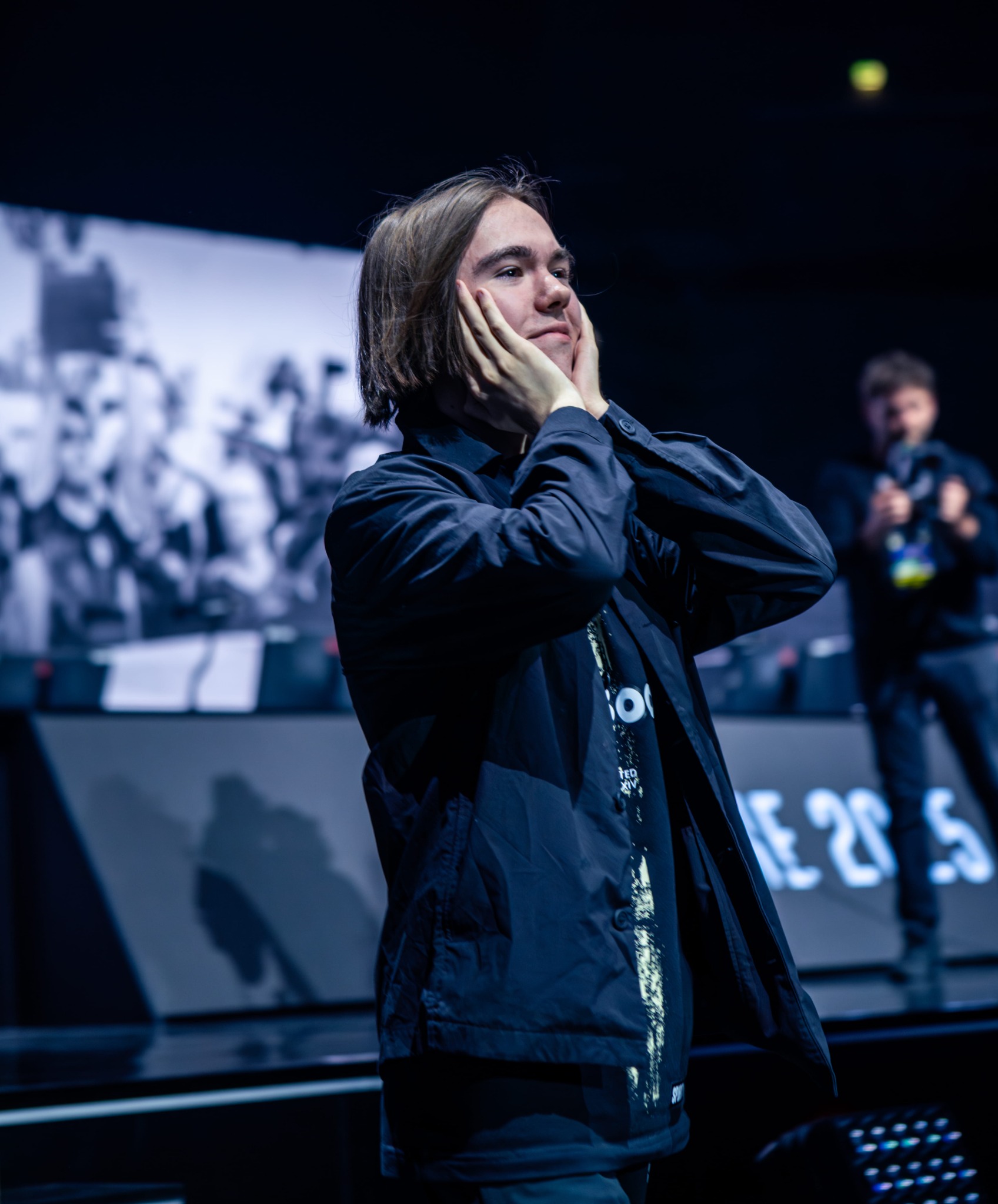 Player reacting emotionally on stage