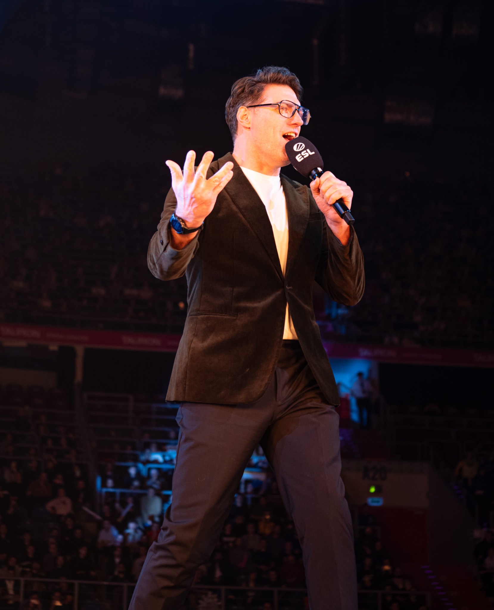 Esports host speaking on stage