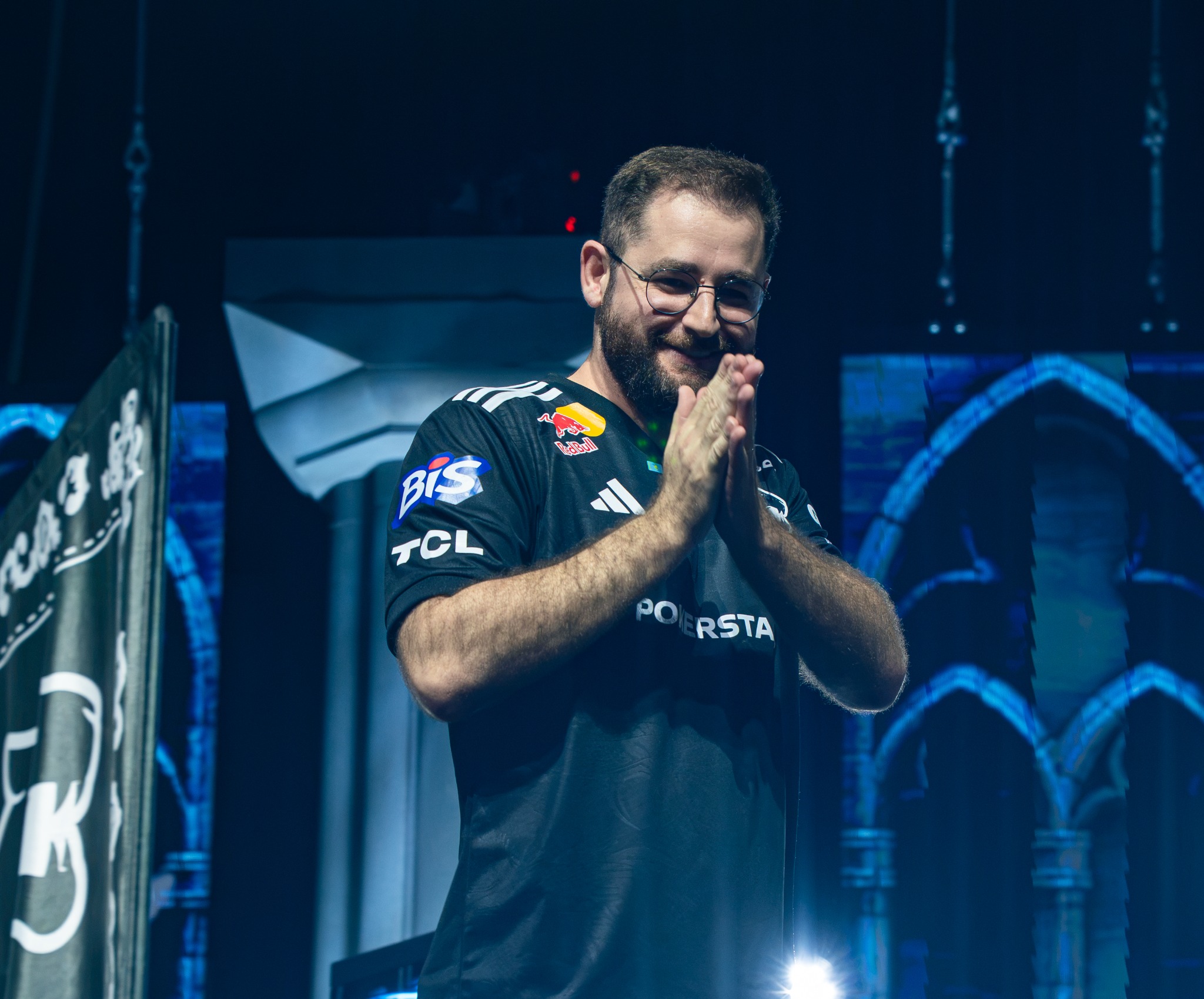 Player applauding on stage