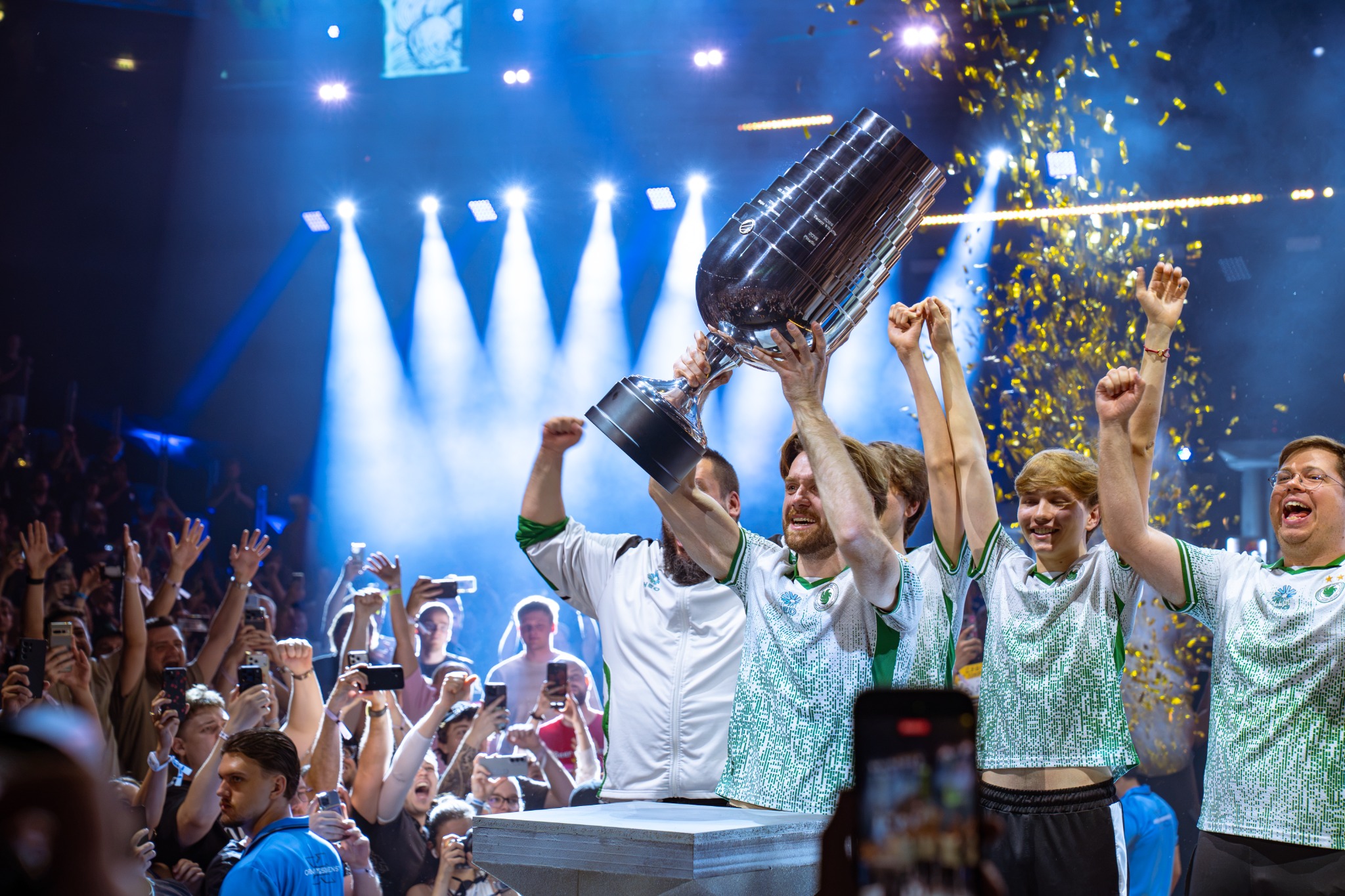Team celebrating with the trophy